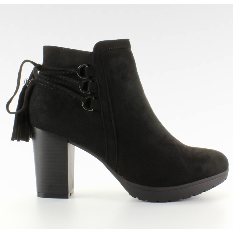 Svarta dekorativa klackar med snören