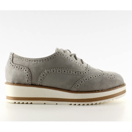 Mockasiner på högsålen grå