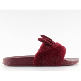 Tofflor med päls och rödbruna öron