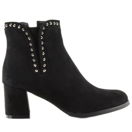 Svarta Svarta Stövlar På Hög Klack