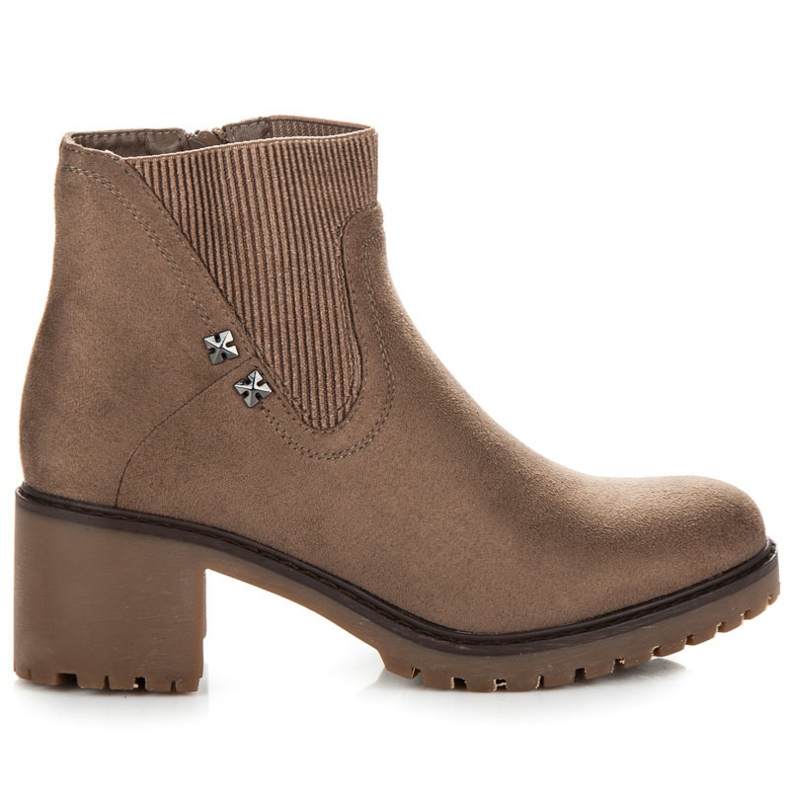 Milaya Stövlar på ett stort inlägg brun