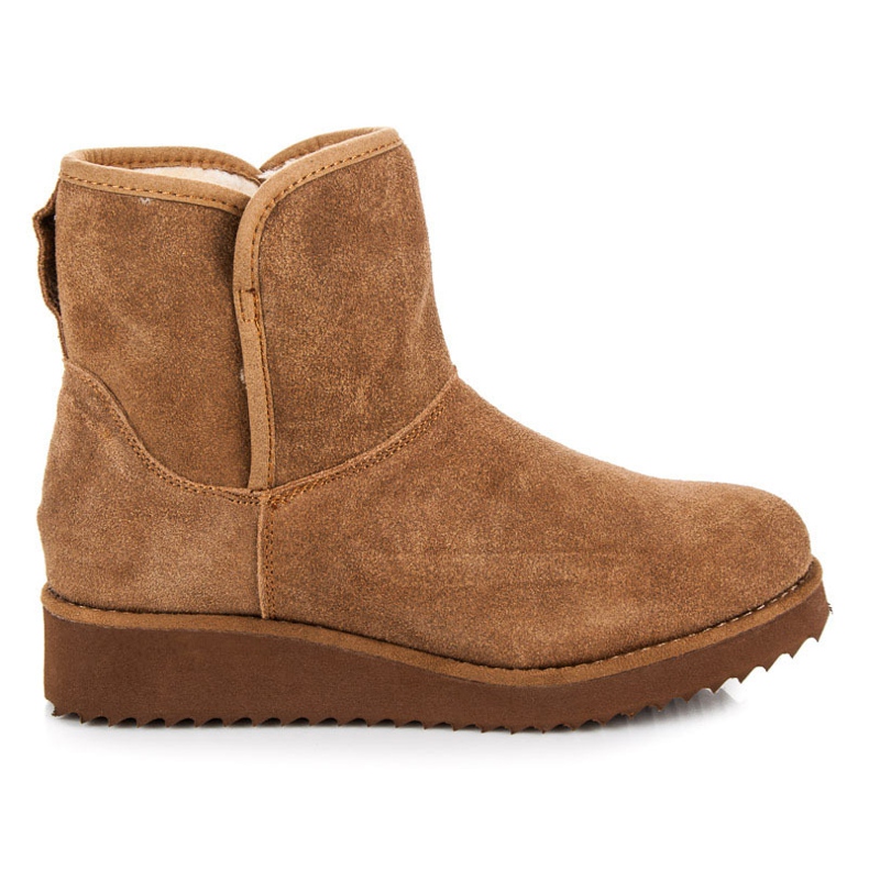 Coco Perla Muluki på perrongen brun