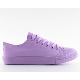 Lila kvinnors enfärgade lila sneakers violett