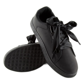 Svarta BL1250-SP svarta sneakers med ett band