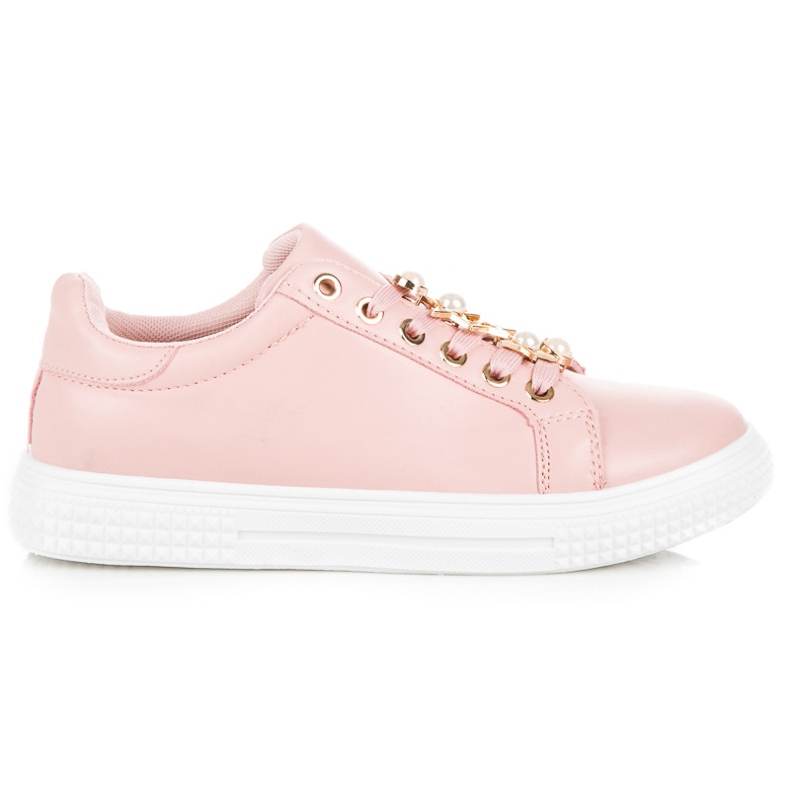 Rosa sneakers med en prydnad