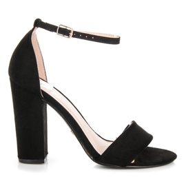 Seastar Mockasandaler på en stolpe svart