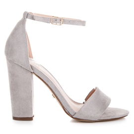 Seastar Mockasandaler på en stolpe grå