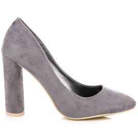 Mocka pumpar på en pelare grå