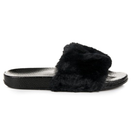 Svarta tofflor med päls