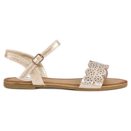 Comer Platta sandaler fästs med ett spänne gul