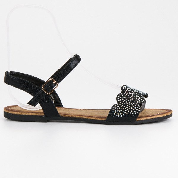 Comer Platta sandaler fästs med ett spänne svart