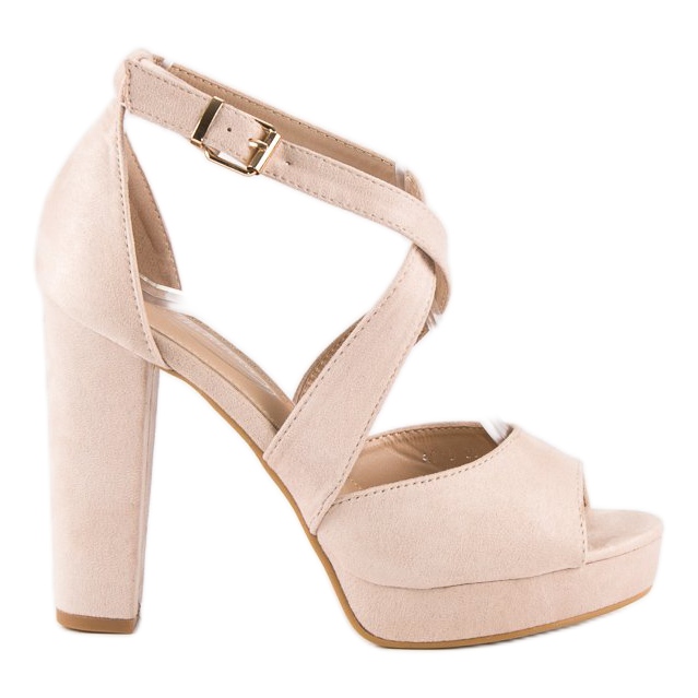 Sandaler på en hög stolpe brun mångfärgad