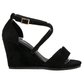 Svarta mockasandaler