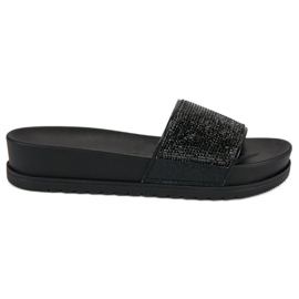 Snygga svarta tofflor