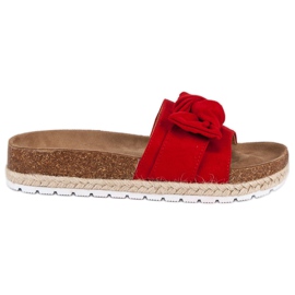 Röda tofflor med rosett