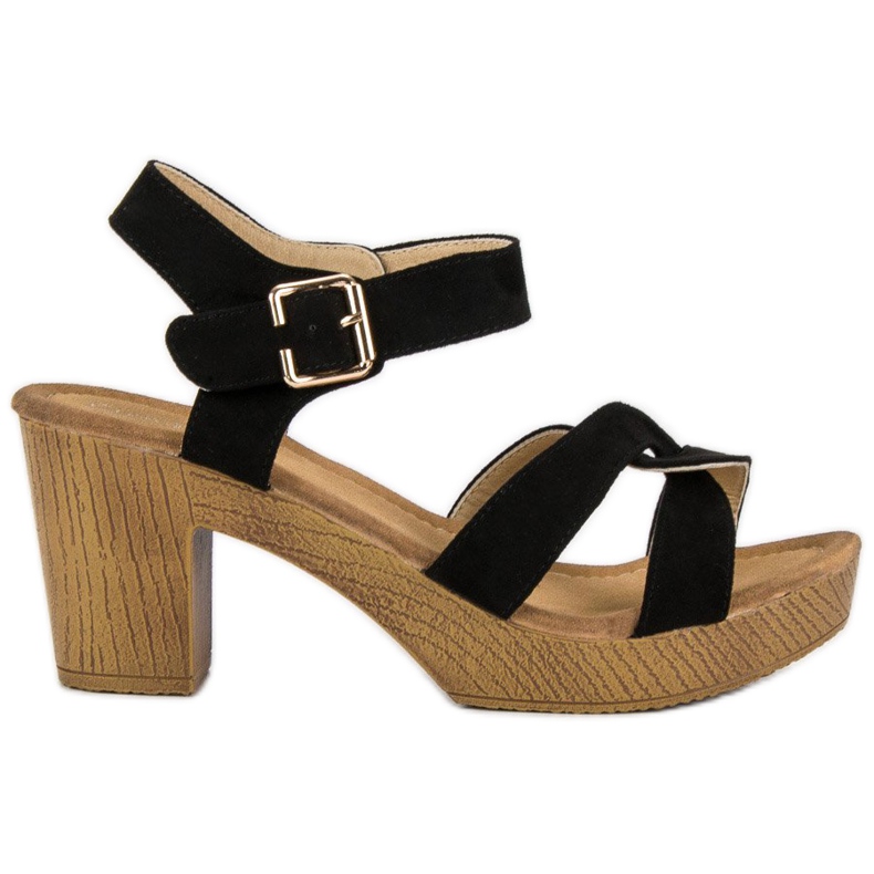 Lätta sandaler på en stolpe svart