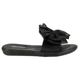 Tofflor med rosett svart