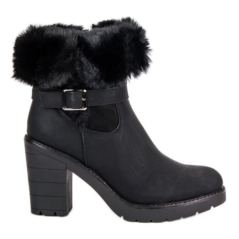 Varma stövlar på stolpen svart