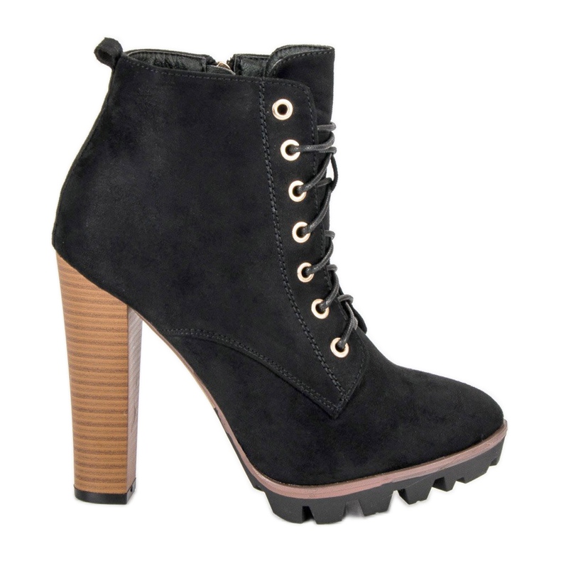 Svart bundna fotbollsskor