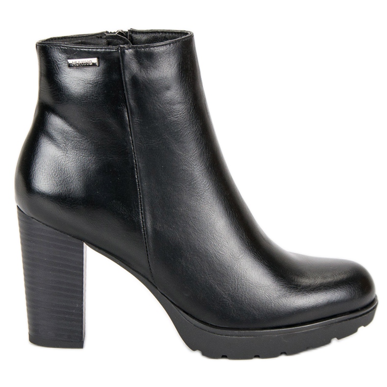 Weide Svarta fotkängor på stolpen