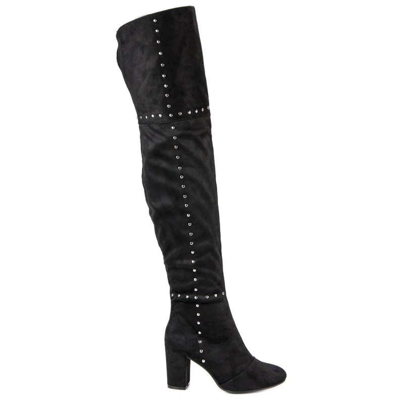 Svarta lårstövlar på stolpen