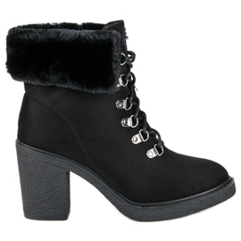 Juliet Knutna stövlar på stolpen svart