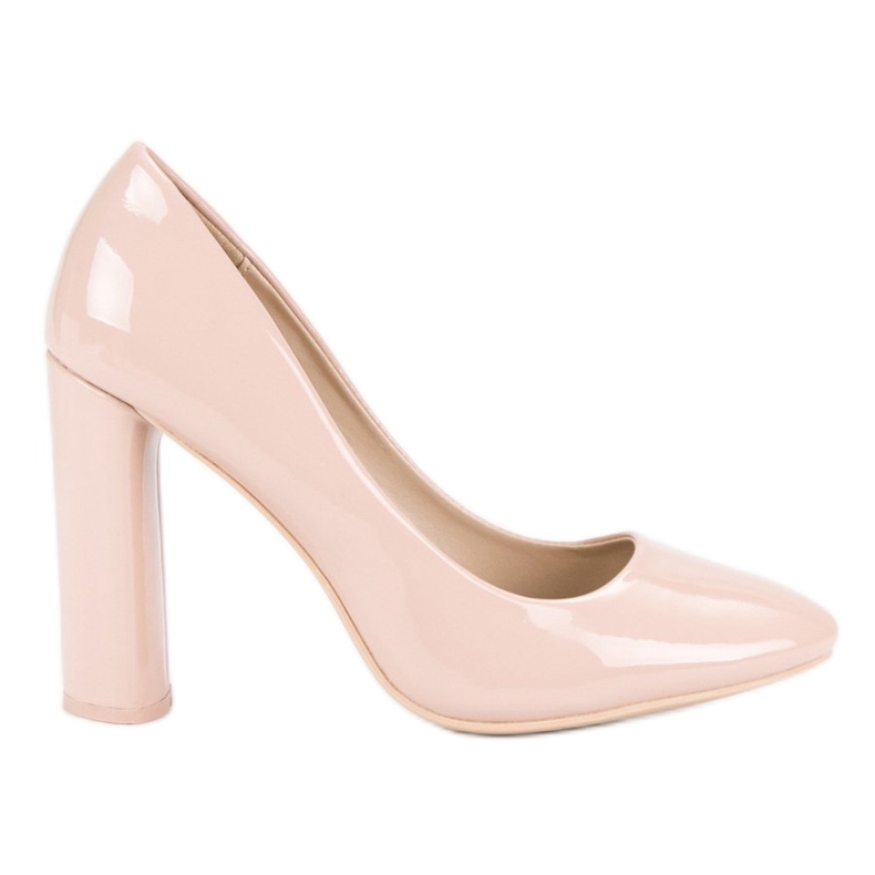 Lackerade pumpar på en pelare brun