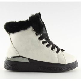 Svarta isolerade sneakers F506 vita