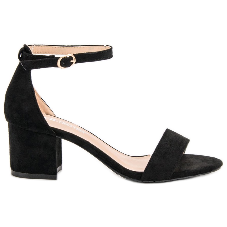 Ch. Creation Klassiska sandaler på en bar svart