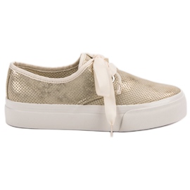 Kylie Sneakers bundna med ett band gul