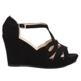 Svarta sandaler på en svart kil LM-002 Svart