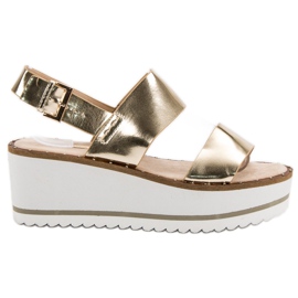 Corina Gyllene sandaler på plattformen