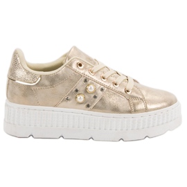 Gyllene skor på plattformen