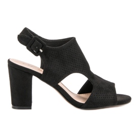 Openwork sandaler på ett inlägg svart
