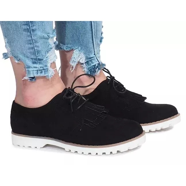 Svarta fransade loafers från Crushing Hard