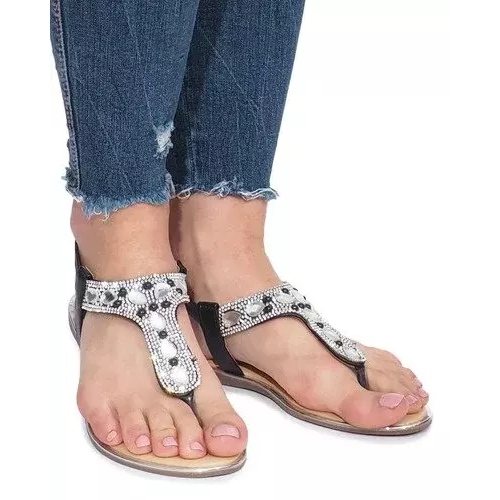 Svarta platta sandaler med Larissa -diamanter