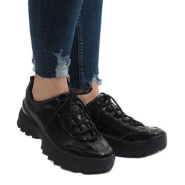 Svarta trendiga sportskor 82017