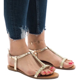 Gyllene sandaler dekorerade med SY-644