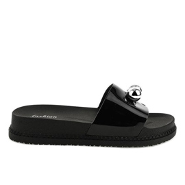 Svarta tofflor med bollar 1819