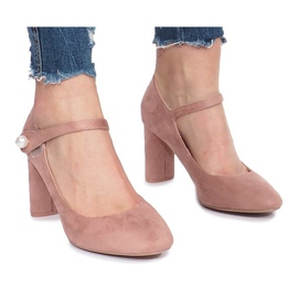 Rosa pumps på Milaya -stolpen