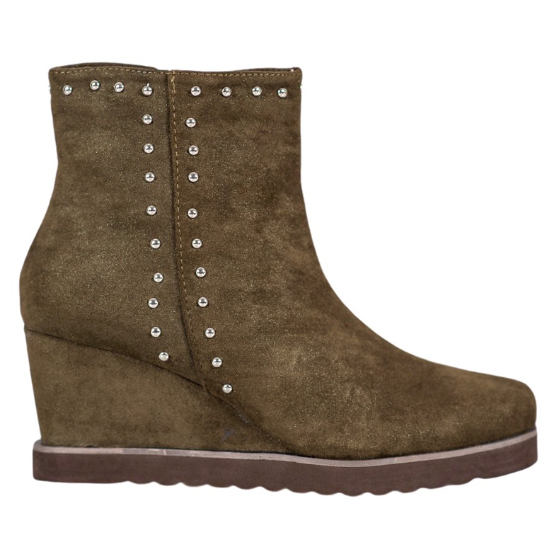 Kylie Gröna stövlar på en kil