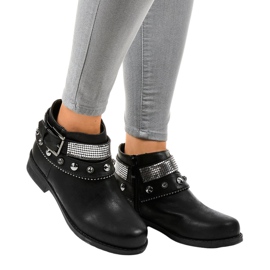 Svarta stövlar dekorerade med en LL178 dragkedja