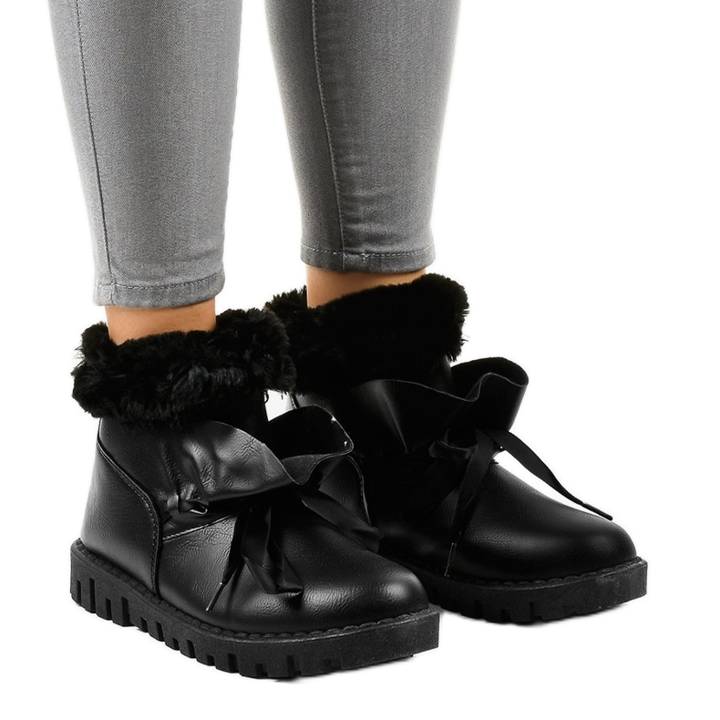 Svarta isolerade sneakers med 428-6 dragkedja