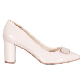 Sergio Leone Eleganta pumpar på en pelare brun