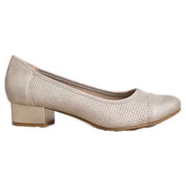 Goodin Genombrutna pumpar på en pelare brun gul