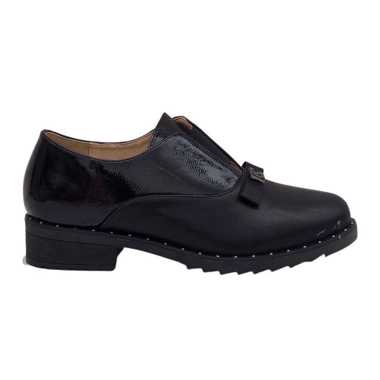 Svarta slip-on skor med X528 dubbar