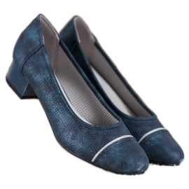 Goodin Genombrutna pumpar på en pelare blå