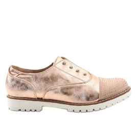 Guld-slip-on skor med GF-FD9 dubbar gyllene