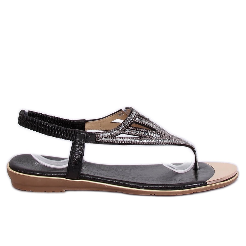 Flip-flops dekorerade med svart M03 svart