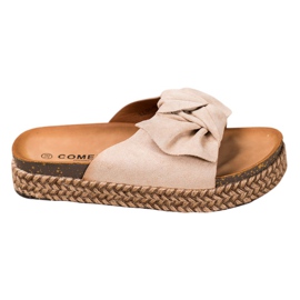 Comer Tofflor På En Hög Plattform brun